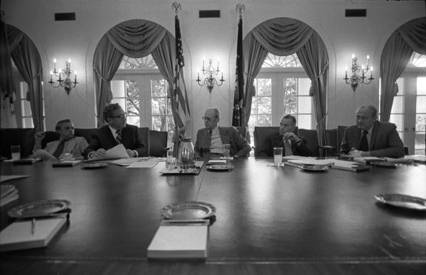 Ambassador L. Dean Brown, Secretary of State Henry Kissinger, President Gerald Ford, Deputy Secretary of Defense William Clements, and Secretary John Marsh attend a meeting of the National Security Council in the White House Cabinet Room, 6/17/976.