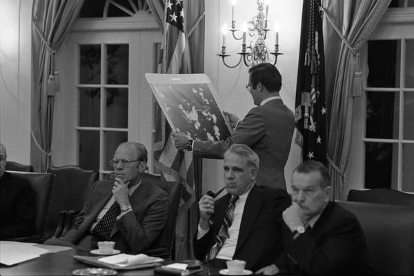 Robert Ingersoll, Gerald Ford, James Schlesinger and William Clements attend a National Security Council Meeting regarding the seizure of the SS Mayaguez in the White House Cabinet Room, 5/12/1975.
